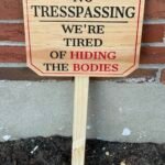 No Trespassing, We're Tired of Hiding the Bodies Sign - natural